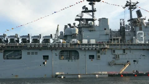 Tracking shot of USS Kearsarge’s bow with tiltrotors in Stockholm 스톡 동영상 320744337