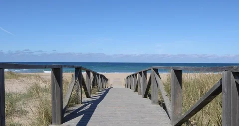 Tracking shot on walkway to the beach Stock Footage 91071409