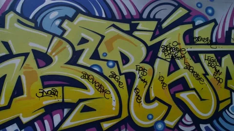 Tracking shot of wall covered in graffiti in Sydney slow motion 4K Stock Footage 202293920