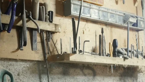 Tracking shot on a wall full of carpenter's tools Stock-Footage 88805227