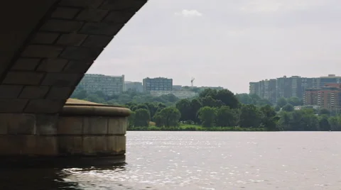 Tracking shot of the Washington DC slowly appearing while under the bridge Stock Footage 60788481