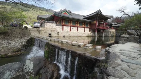 Tracking shot of the waterfall at the temple in Suncheon, Korea Stock Footage 78670668