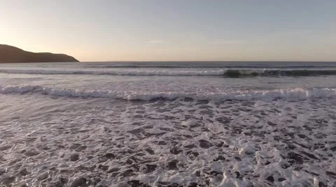 Tracking shot of waves on a beach Stock Footage 44753665