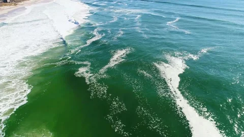 Tracking shot on waves washing up to shore Stock Footage 155466228