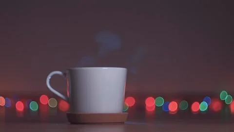 Tracking shot a white cup with a hot drink. white mug steam Stock Footage 99600187