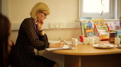 Tracking shot woman taking notes Stock Footage 44250694