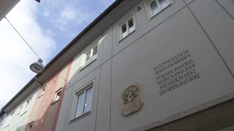 Tracking shot written murals on palace, Lienz Video stock 79655081