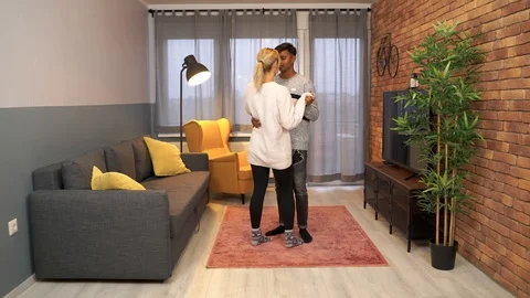 Tracking shot of young couple dancing together. Stock Footage 119302076