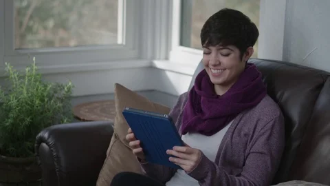 Tracking shot of a young lady using a notebook Stock Footage 71326820