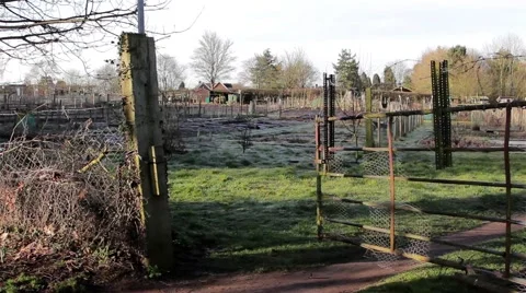 Tracking Show through gate of Allotment - Rural Village / Town Scenes Stock Footage 48982511