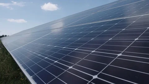 Tracking slider close up of solar panels generating renewable energy Video stock 78040935
