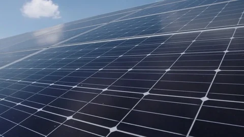 Tracking slider close up of solar panels generating renewable energy Video stock 78041118