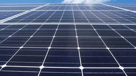 Tracking slider close up of solar panels generating renewable energy Video stock 78041388