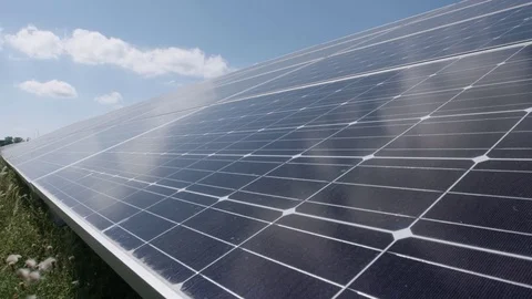 Tracking slider shot of solar panels generating renewable energy 動画素材 78041755