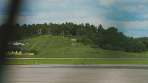 Tracking Small Single Engine Turboprop Plane During Take Off. Plane Leaves Stock Footage 99376184