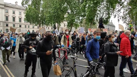 Tracking through crowd at Black Lives Matter Protest Rally March London 4K Stock Footage 132078058