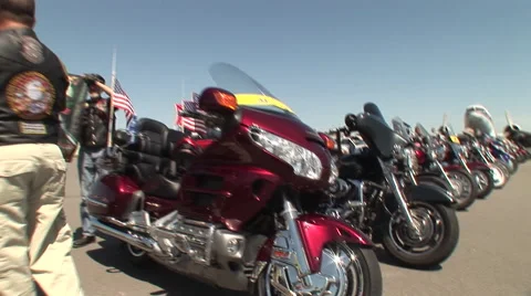 Tracking through a longggg row of motorcycles Stock Footage 41068154