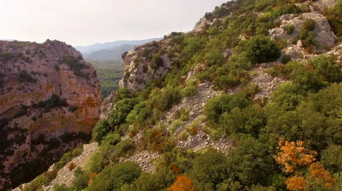 Tracking Through Mountains in a Gorge 4K Stock Footage 66907760