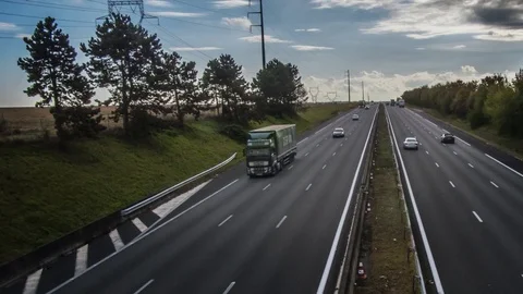 Tracking time-lapse shot of busy highway Stock Footage 78603618