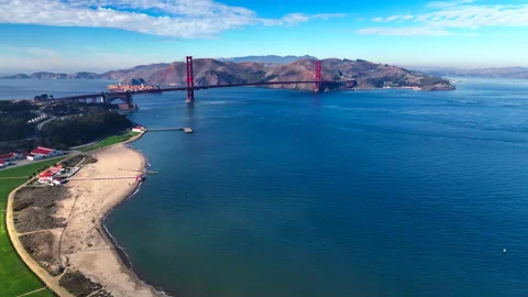 Tracking toward San Francisco bridge with grass on left Stock Footage 336793009