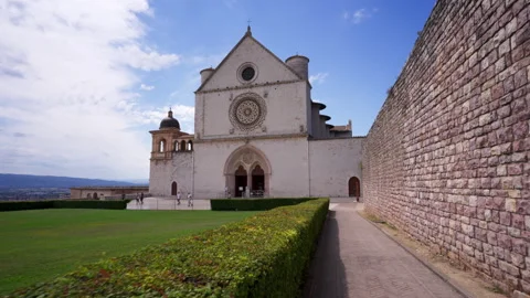 Tracking towards the facade of the Basilica of Saint Francis of Assisi Stock Footage 248040666