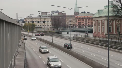 Tracking traffic, slow motion tilt of Centralbron in Stockholm Stock Footage 143268813