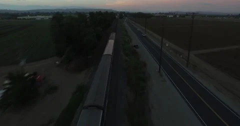 Tracking Train Across Railroad Tracks Stock Footage 63612936