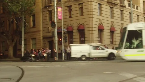Tracking tram in the city of Melbourne Stock Footage 73857150