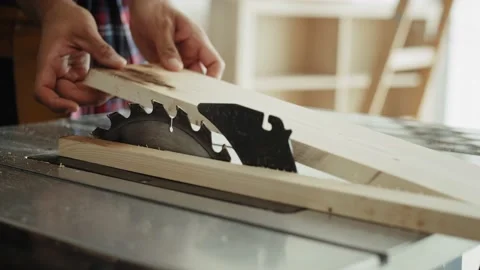 Tracking video of carpenter looking at a piece of plank Stockbeeldmateriaal 137086861