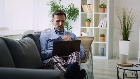 Tracking video of man working at home on sick leave. Video stock 128878287