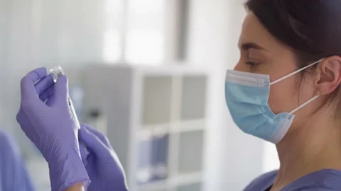 Tracking video of a selfie during vaccination. Stock Footage 154357859
