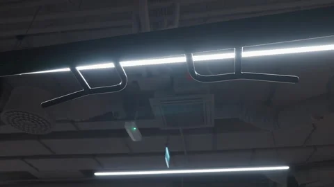 Tracking View Along Pull-Up Handles Under Gym Ceiling Vidéo 346790105