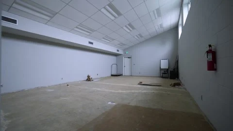 Tracking View of Empty Room Undergoing Construction Remodeling Stock-Footage 267436735