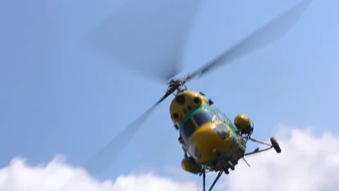 Tracking view up helicopter up in air perform unbelievable acrobatic maneuvers Stock Footage 191157337