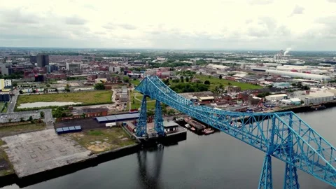 Tracking View of River Tees Middlesbrough Transporter Bridge, Tees Dock Stock Footage 196109448