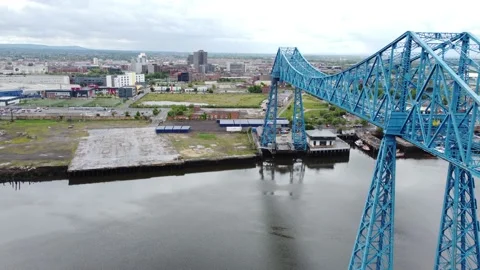 Tracking View of River Tees Middlesbrough Transporter Bridge, Tees Dock Stock Footage 196110487