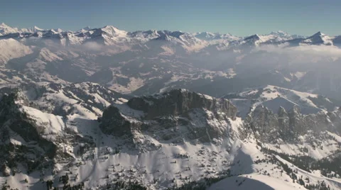 TrackingAcrossMountainPeaks -0022 Stock Footage 64719577