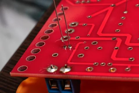 Tracks on a circuit board close up Stock Photos