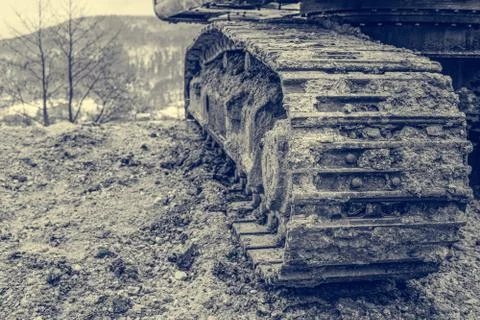 Tracks of a excavator machine on a construction site. Stock Photos