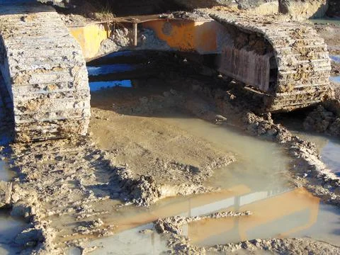 The tracks of an excavator in the mud Fotos de archivo