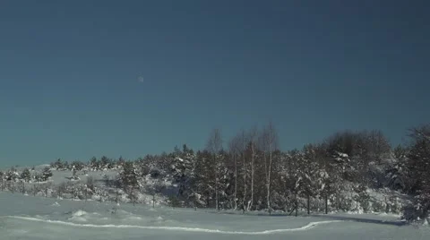 Tracks Snow Winter Moon at Daytime 4K.mp4 Stock Footage 59771689