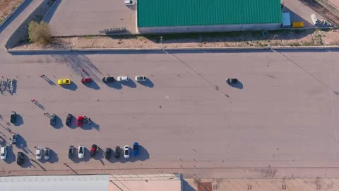 Trackside Pause: Aerial View of Parked Race Cars Stock Footage 263477782