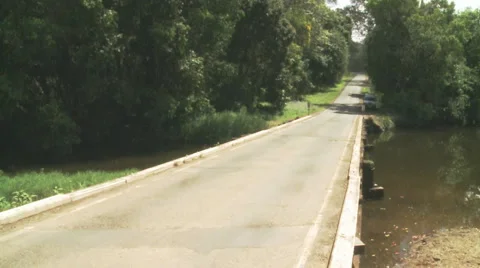 Tracktor on bridge Motion JPEG Stock Footage 5502970