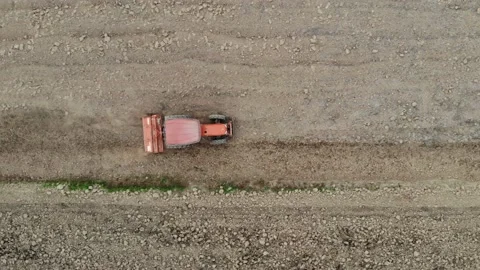 Tracktor working on rice land prepare plantation Stock Footage 152745408