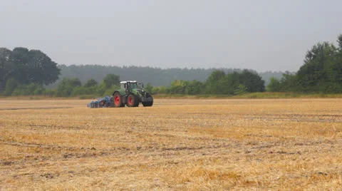 Tractor on agricultural field 스톡 동영상 25941307