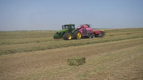 Tractor and Bailor (3) Stock Footage 221861320