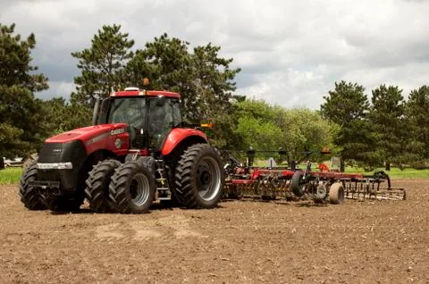 Tractor and disk harrow 库存照片