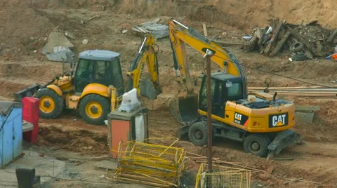 Tractor and Excavator in the Moscow Stock Footage