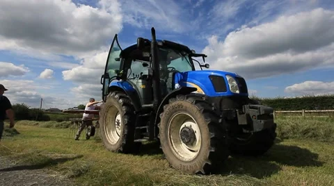 Tractor and Farm Labour Stock Footage 7903733
