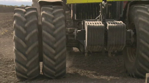 Tractor and implement turn at end of field Stock Footage 866944